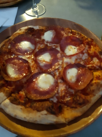 My pepperoni pizza. A friend enjoyed a Italian sausage one. Copyright Lloyd Marken.